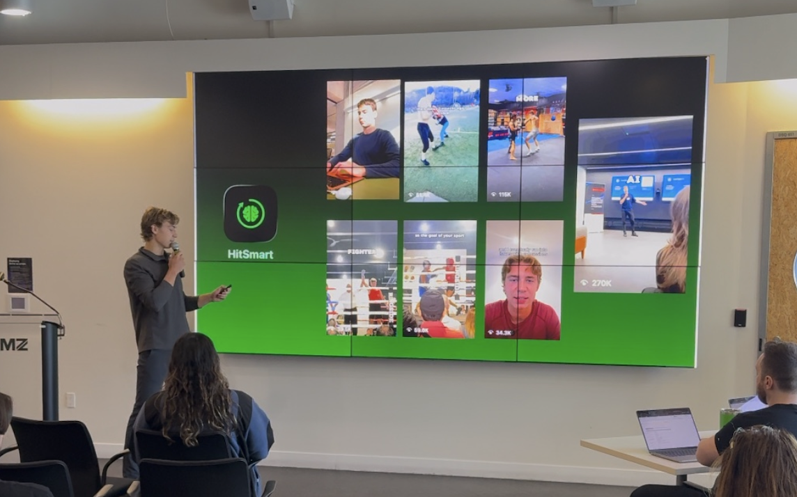 Miles presenting the HitSmart combat sports app to an audience